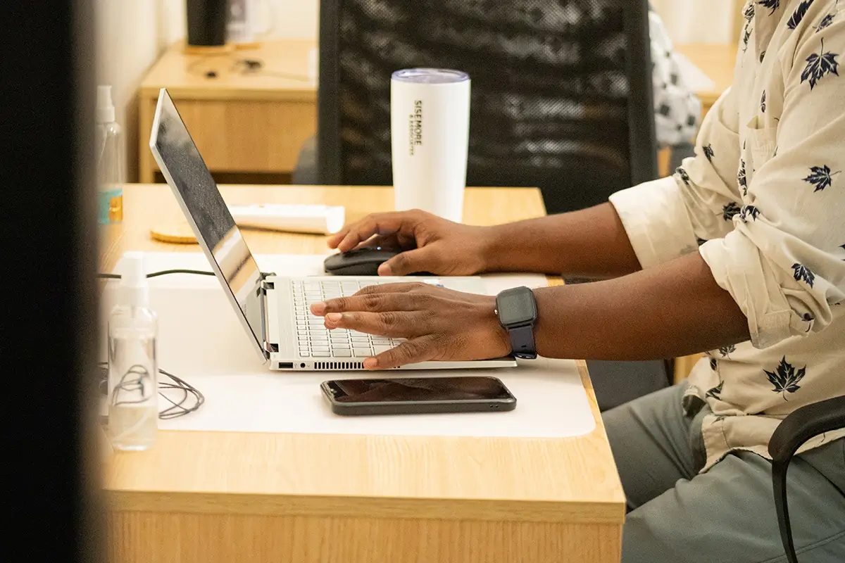 A developer working on a laptop