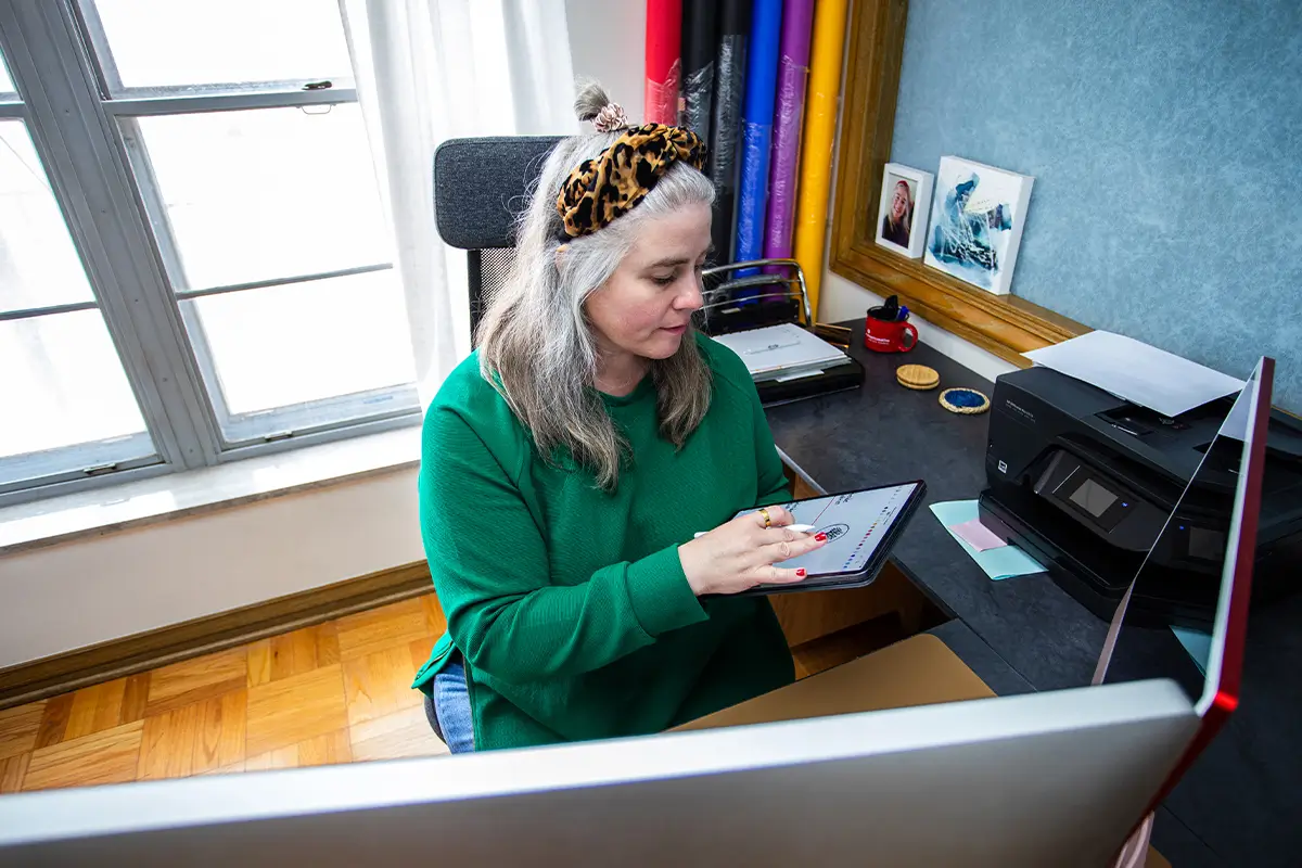 Designer looking in iPad